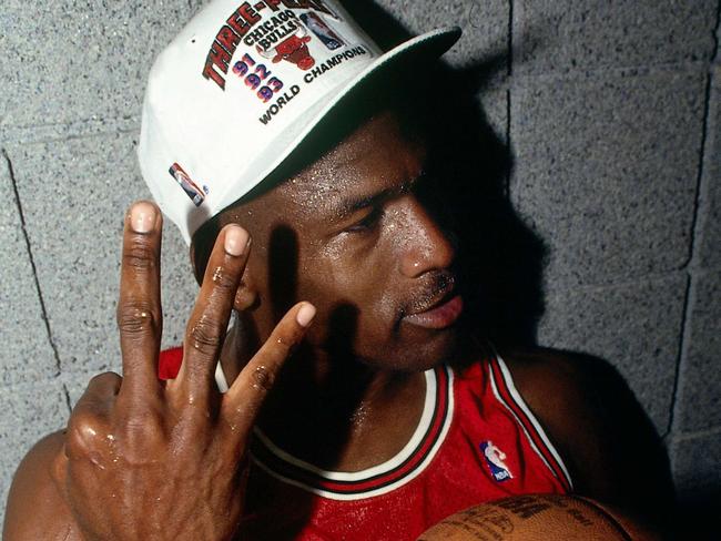 PHOENIX - JUNE 20:  Michael Jordan #23 of the Chicago Bulls celebrates winning the NBA Championship after Game Six of the 1993 NBA Finals on June 20, 1993 at th America West Arena in Phoenix, Arizona.  The Bulls won 99-98.  NOTE TO USER: User expressly acknowledges and agrees that, by downloading and/or using this Photograph, user is consenting to the terms and conditions of the Getty Images License Agreement. Mandatory Copyright Notice: Copyright 1993 NBAE  (Photo by Andrew D. Bernstein/NBAE via Getty Images)