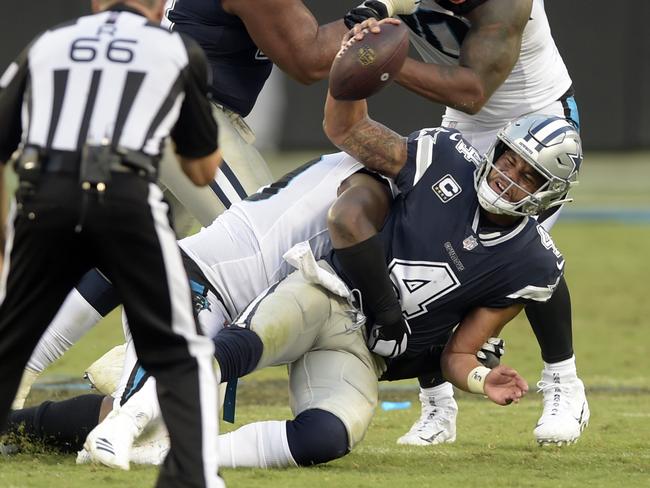 Dallas Cowboys' quarterback Dak Prescott (4) is sacked by Carolina Panthers' Kawann Short. Picture: AP