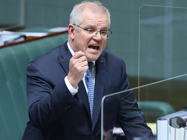 CANBERRA, AUSTRALIA NewsWire Photos AUGUST 23, 2021:  The Prime Minister Scott Morrison behind a new clear screen during Question Time in the House of Representatives in Parliament House Canberra.Picture: NCA NewsWire / Gary Ramage