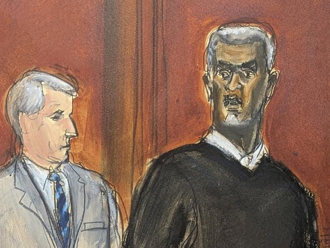 Sean 'Diddy' Combs, right, stands and looks at jurors as they file into the jury box at the start of jury selection at Manhattan federal court, Monday, May 5, 2025, in New York. (Elizabeth Williams via AP)