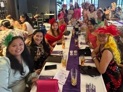 Imelda Barsby, Ruby Dawson, Elena Gear, Rowana Casey, Rolinda Dunmore, Irish Jamieson, Chelsea Lancero, Elsa James, Jess Martel, Elsie Sutherland, Josie Shiel, Grace Firmstone, and Mel Cross celebrating the Melbourne Cup at Gympie RSL Club.