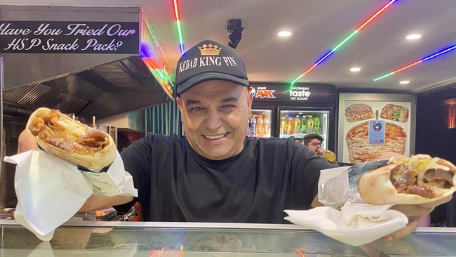 Kebab Zone manager Kadir Akca with two mixed special kebabs. Picture: Nic Darveniza