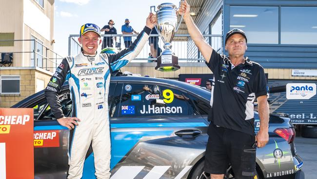 Jay Hanson celebrates a race win with his father Dale. Picture Daniel Kalisz.