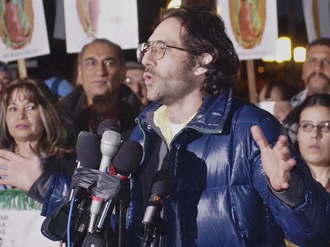 In this 2003 file photo, Dov Charney announces he will shutter his manufacturing plant to observe an economic strike by Latinos.