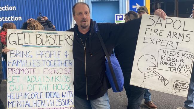 Steven Gemmell, a gel blaster store owner protesting new licencing laws at Police HQ. Picture: Dixie Sulda