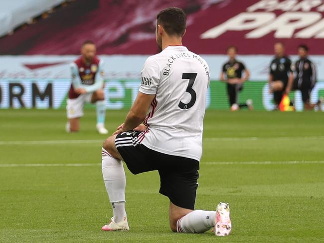 Premier League stars take a knee on restart