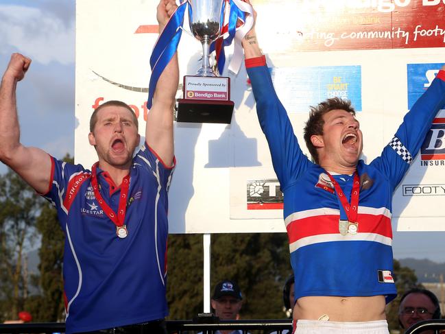 Leigh Adams lifting South Croydon’s premiership cup with captain Daniel King.