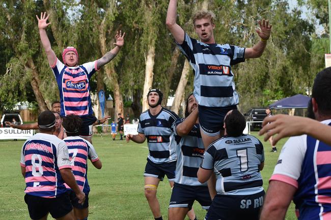 Moranbah's Teran McCasker and Slade Point's Travis John in action in the Slade Point Slashers v Moranbah Bulls in Mackay Rugby Union Round 4 Seniors A-Grade Anzac Day clash at Cathy Freeman Oval in Slade Point. Saturday, April 23, 2022. Picture: Max O'Driscoll