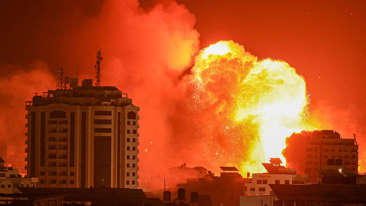 A fireball erupts from an Israeli air strike in Gaza City on October 9. Picture: MAHMUD HAMS/AFP