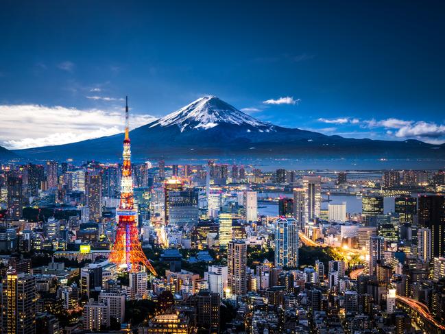 View of Mt. Fuji and Tokyo skyline at dusk.Escape 13 August 2023Why I travelPhoto - iStock