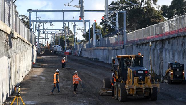 Tradies have been working round the clock to dig a rail trench as deep as 30 metres at Cheltenham. Picture: Penny Stephens