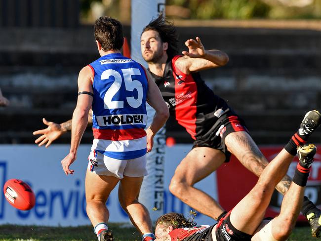 4/06/2016 West Adelaide v Central District at Richmond Oval.Central's Luke Habel kicks a goal and celebrates over the top of West players. Picture Mark Brake