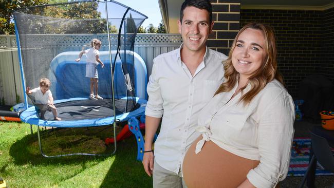 George and Rebecca Lekkas, whose third child is due soon, are hoping to free up more ‘quality family time’ this year. Picture: Brenton Edwards