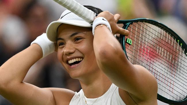 TOPSHOT - Britain's Emma Raducanu celebrates winning against Greece's Maria Sakkari during their women's singles tennis match on the fifth day of the 2024 Wimbledon Championships at The All England Lawn Tennis and Croquet Club in Wimbledon, southwest London, on July 5, 2024. (Photo by Glyn KIRK / AFP) / RESTRICTED TO EDITORIAL USE