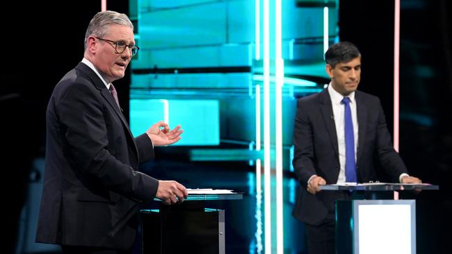 Labour Party leader Keir Starmer (L) and Prime Minister Rishi Sunak speak on stage during their first head-to-head debate. Picture: ITV via Getty Images.