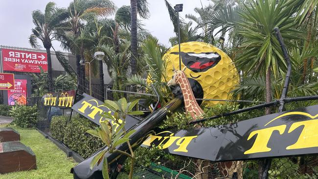 The iconic golf ball at Putt Putt Mermaid Beach is down following Tropical Cyclone Alfred. Photo: Nigel Hallett.