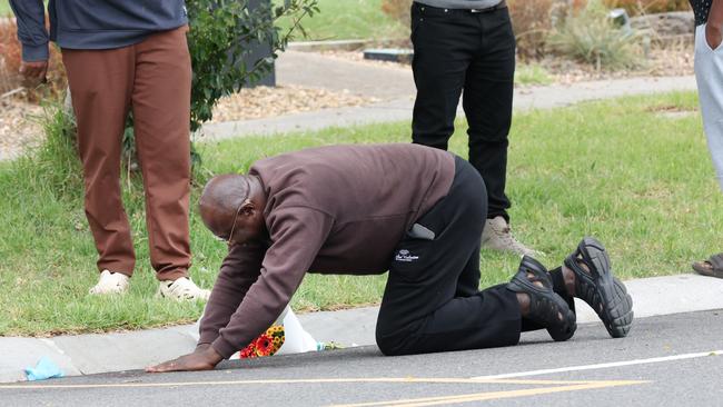 Samuel Mwanza, the father of Nathan, breaks down at the scene on Wednesday. Picture: David Crosling