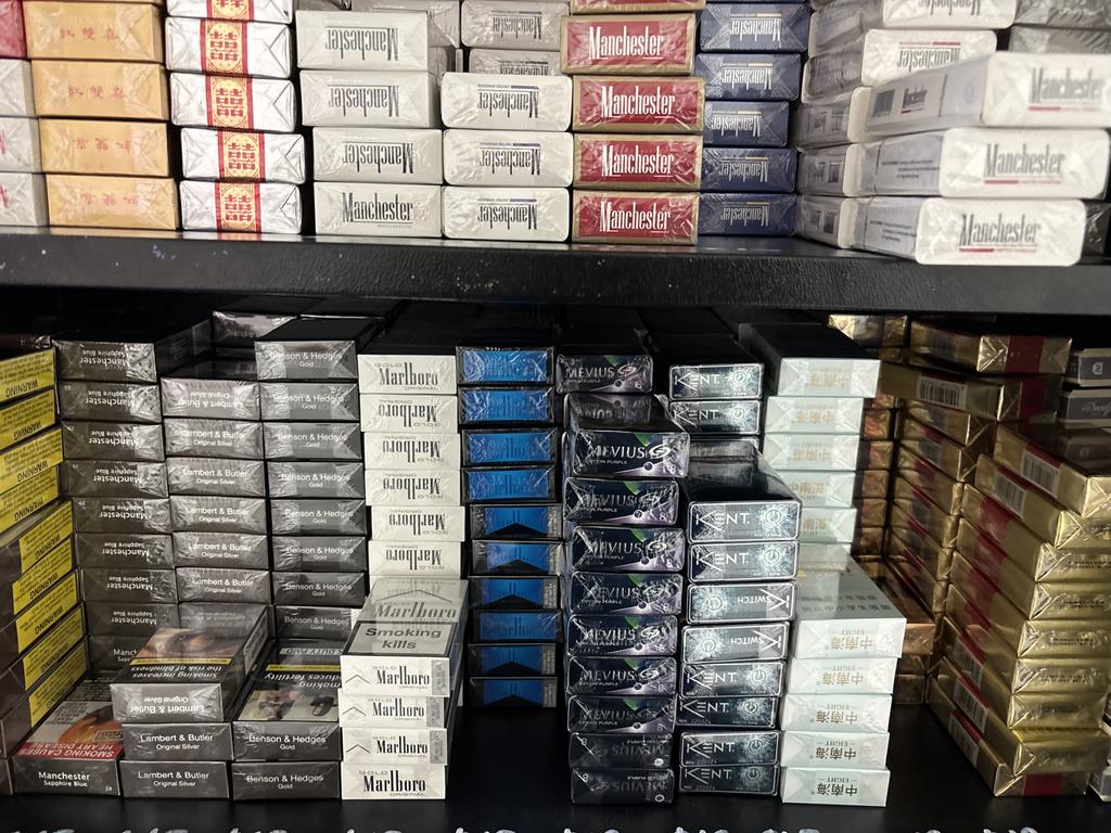 Hundreds of thousands of seized cigarettes and vapes.