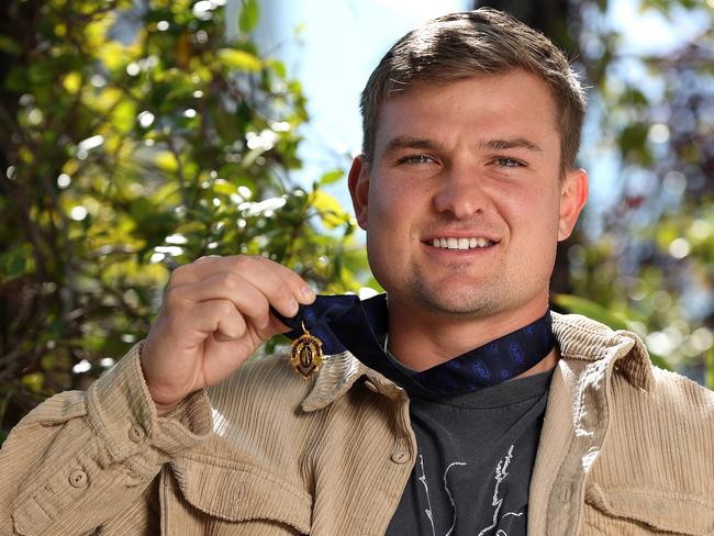 PERTH, AUSTRALIA - SEPTEMBER 20: Ollie Wines poses during a press conference following his 2021 Brownlow Medal win at Crown Towers on September 20, 2021 in Perth, Australia. (Photo by Paul Kane/Getty Images)
