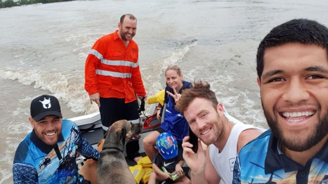 John Asiata, Antonio Winterstein and Gavin Cooper out helping in the floods.