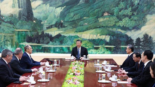 Russian Foreign Minister Sergei Lavrov and China's President Xi Jinping.