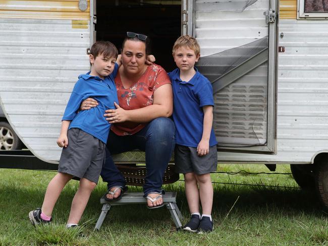 Karen Fullick and her sons Braiden, 8, left, and Logan, 7, lost their home in the bushfires near Coffs Harbour and will be spending this Christmas in a caravan. Picture: David Swift