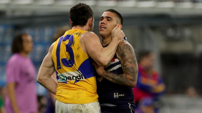 Michael Walters and Luke Shuey tangle. Pic: AAP