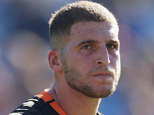 SYDNEY, AUSTRALIA - MARCH 19:  Adam Doueihi of the Wests Tigers looks on during the round three NRL match between Canterbury Bulldogs and Wests Tigers at Belmore Sports Ground on March 19, 2023 in Sydney, Australia. (Photo by Mark Metcalfe/Getty Images)