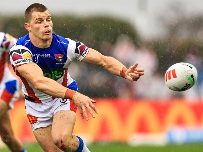 TAMWORTH, AUSTRALIA - MAY 11: Jayden Brailey of the Knights passes the ball during the round 10 NRL match between Wests Tigers and Newcastle Knights at Scully Park, on May 11, 2024, in Tamworth, Australia. (Photo by Mark Evans/Getty Images)