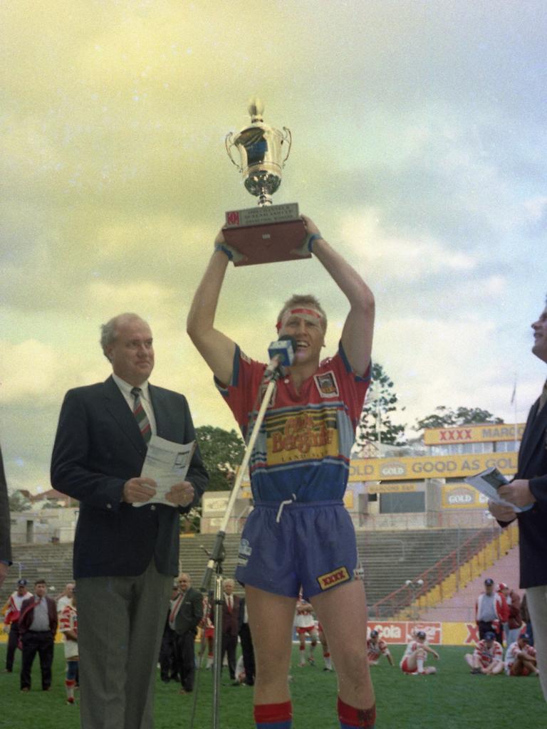 Clydesdales skipper Don Saunders celebrates his side’s grand final win.