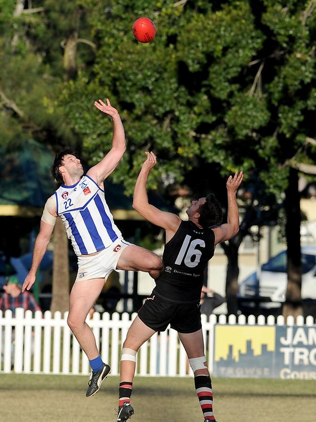 Mt Gravatt ruckman Gareth Hunt and Morningside ruckman Bradley Hodge. Picture, John Gass