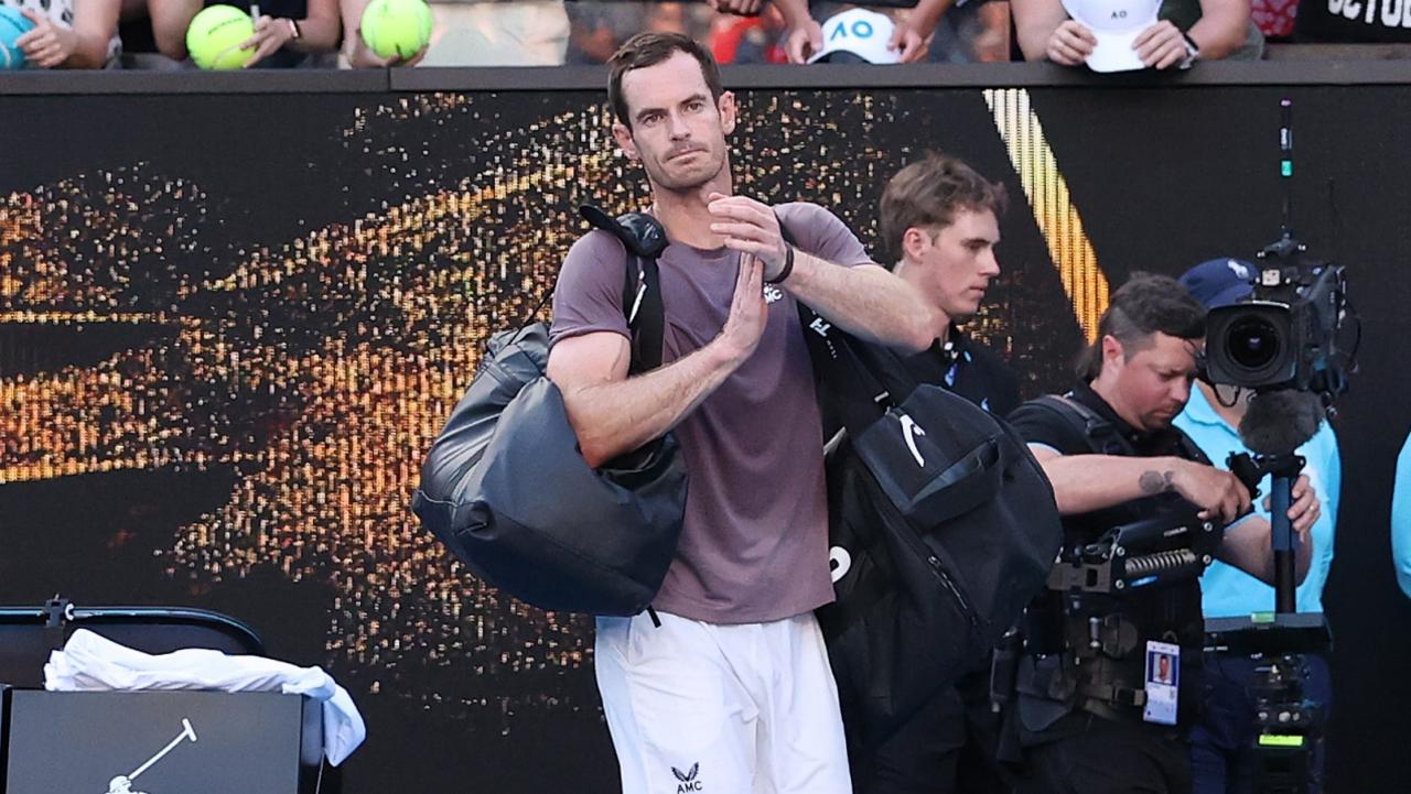 Andy Murray acknowledges the fans after losing his round one match against Tomas Martin Etcheverry. (Photo by Kelly Defina/Getty Images)