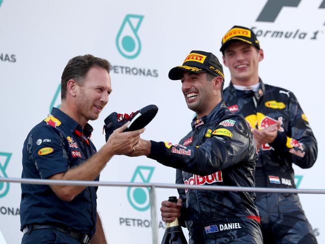 Even Red Bull Racing boss Christian Horner was coaxed into nailing a shoey. Picture: Getty