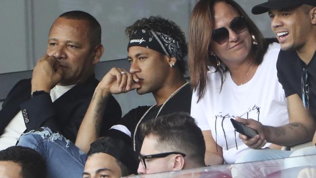 Paris Saint-Germain's Brazilian forward Neymar (2L), flanked by his father Neymar Santos (L).