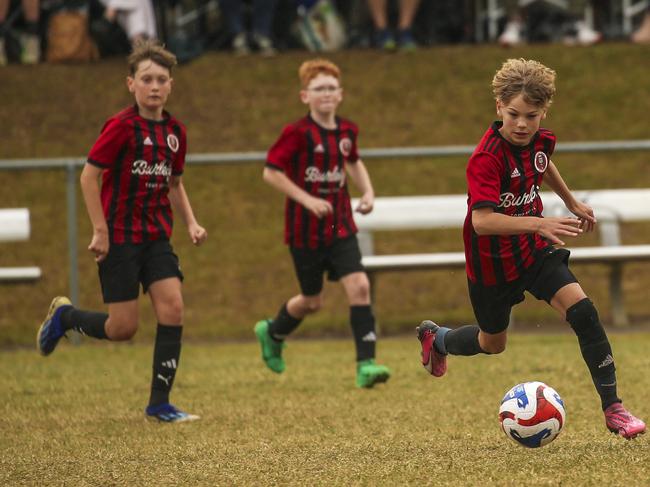 PRINT EDIT U/10Ãs Michelton FC V Burliegh  in the Premier Invitational Football Carnival at Nerang.Picture: Glenn Campbell