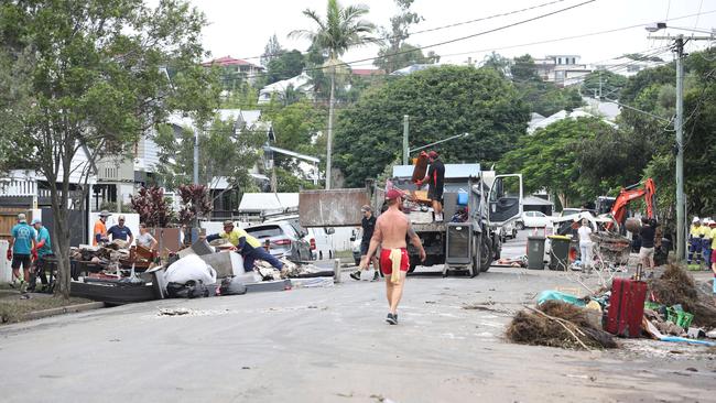 Cleaning up in Vincent St, Auchenflower. Picture: Annette Dew
