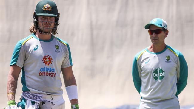 Will Pucovski awaits his time in the nets under the watchful eye of Justin Langer.