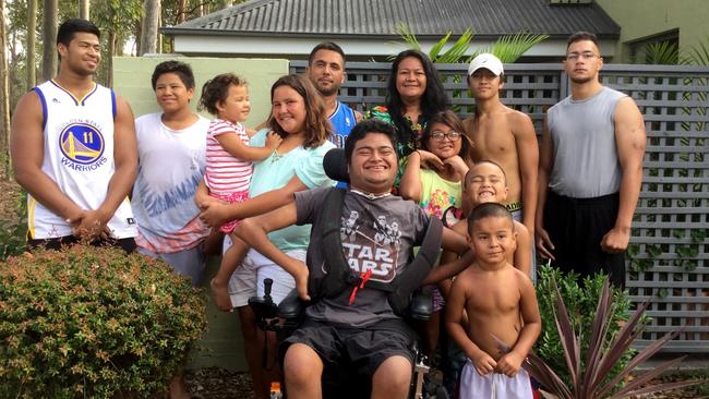 Payne Haas (far left) with his family. His brother Chace is pictured at the front.