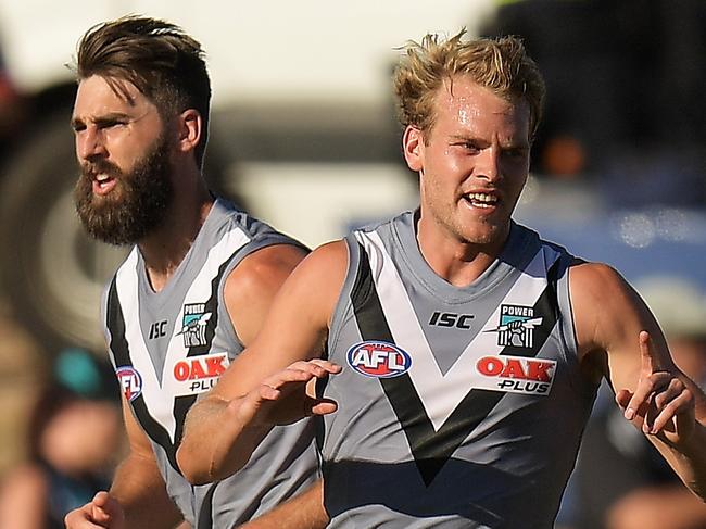 ADELAIDE, AUSTRALIA - MARCH 10:  Justin Westhoff of the Powerof Canberra United Jack Watts of the Power during the JLT Community Series AFL match between Port Adelaide Power and the Adelaide Crows at Alberton Oval on March 10, 2018 in Adelaide, Australia.  (Photo by Daniel Kalisz/Getty Images)