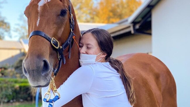 Stable hand Ruby McIntyre has been charged by Racing Victoria for filming Jamie Kah and a plate of white powder