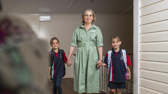 Harristown State School principal Jacqui Coleborn with twins Harper (left) and Charlotte Widgell on their first day of school as year 3 students, Tuesday, January 28, 2025. Picture: Kevin Farmer