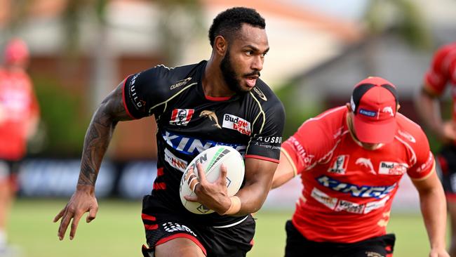 Hamiso Tabuai-Fidow breaks away from the defence during a Dolphins NRL training session at Kayo Stadium on February 14, 2023 in Brisbane, Australia. (Photo by Bradley Kanaris/Getty Images)