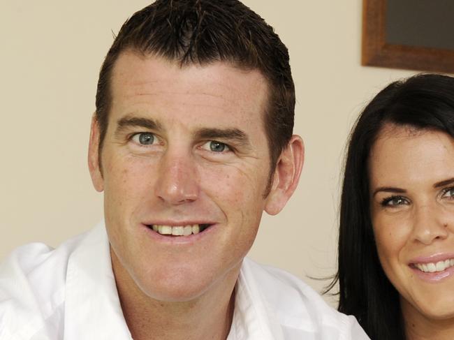 STM ONLY Army Corporal Ben Roberts Smith ( Roberts-Smith ) VC with wife Emma at home (Painting of Army patrol in Afghanistan and T&I flag from Ben's time in East Timor on wall behind)  Ben received the VC for bravery in 2010. REPORT Gail Williams PIC Karin Calvert