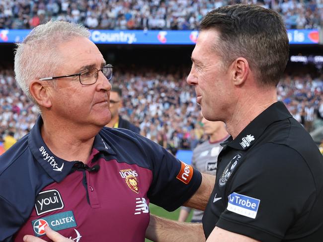 MELBOURNE, AUSTRALIA - SEPTEMBER 30: Lions coach Chris Fagan is acknowledged by Magpies coach Craig McRae during the 2023 AFL Grand Final match between Collingwood Magpies and Brisbane Lions at Melbourne Cricket Ground, on September 30, 2023, in Melbourne, Australia. (Photo by Robert Cianflone/AFL Photos/via Getty Images)