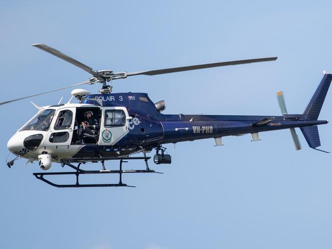 Police chopper pictured above Cabramatta Ave, Miller on Sunday, 16 February 2020 Where an 18 year old male has died after being shot in the chest at Miller in Sydney's south west last night. Just after 11pm yesterday (Saturday 15 February 2020)( Image / Monique Harmer)