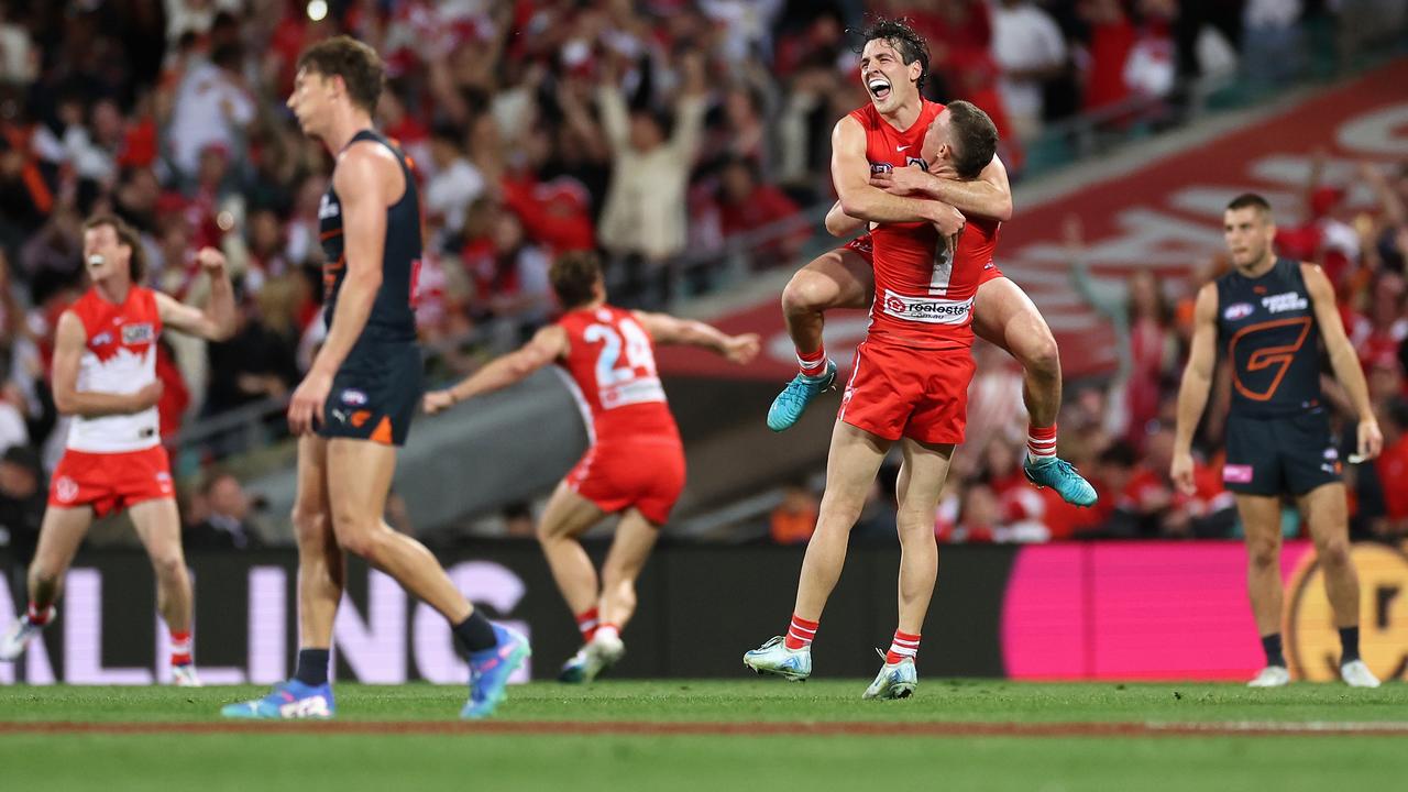 SYDNEY, AUSTRALIA - SEPTEMBER 07: Errol Gulden of the Swans and Chad Warner of the Swans celebrate winning the AFL First Qualifying Final match between Sydney Swans and Greater Western Sydney Giants at Sydney Cricket Ground, on September 07, 2024, in Sydney, Australia. (Photo by Cameron Spencer/Getty Images)