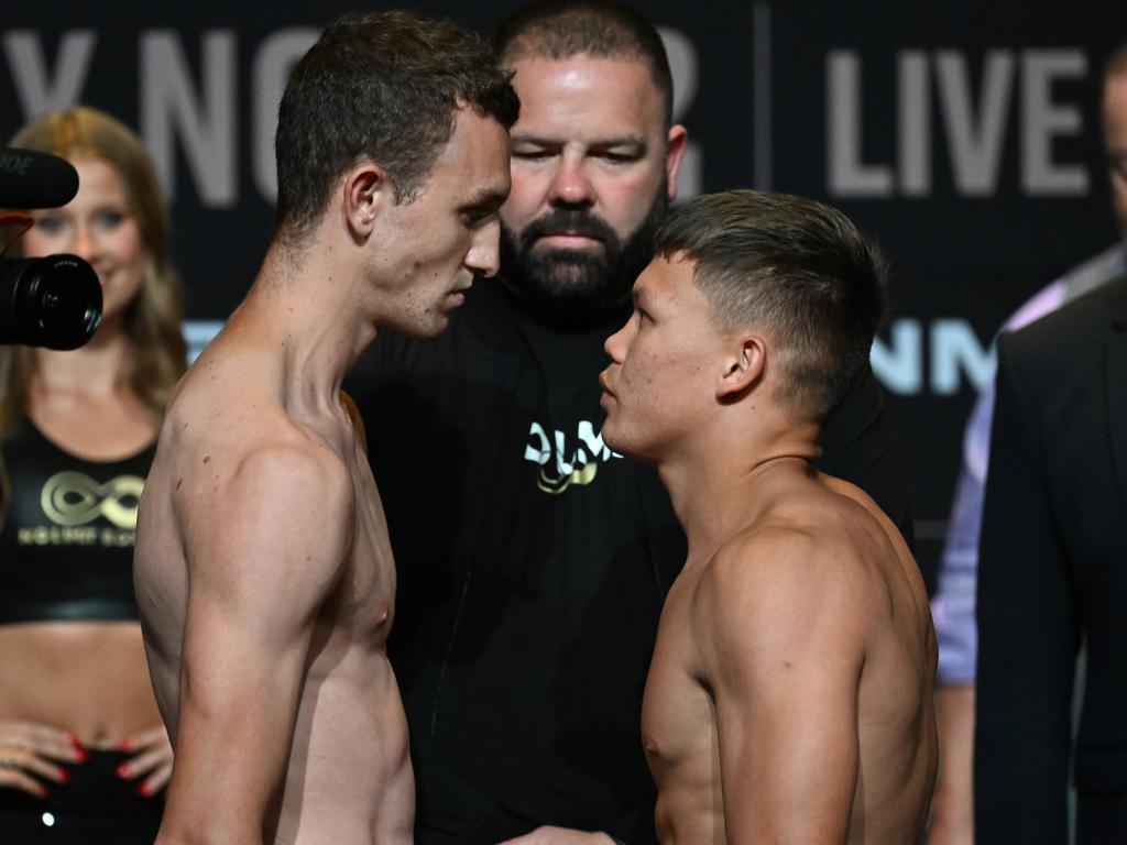 Jason Fawcett (R) is giving up a huge height advantage. Picture: No Limit Boxing
