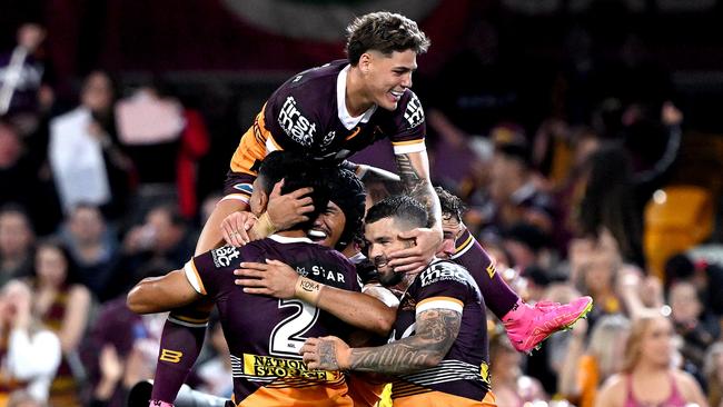 Reece Walsh, Deine Mariner, Brendan Piakura and Adam Reynolds celebrate during a match against the Parramatta Eels in 2023. Picture: Bradley Kanaris/Getty Images