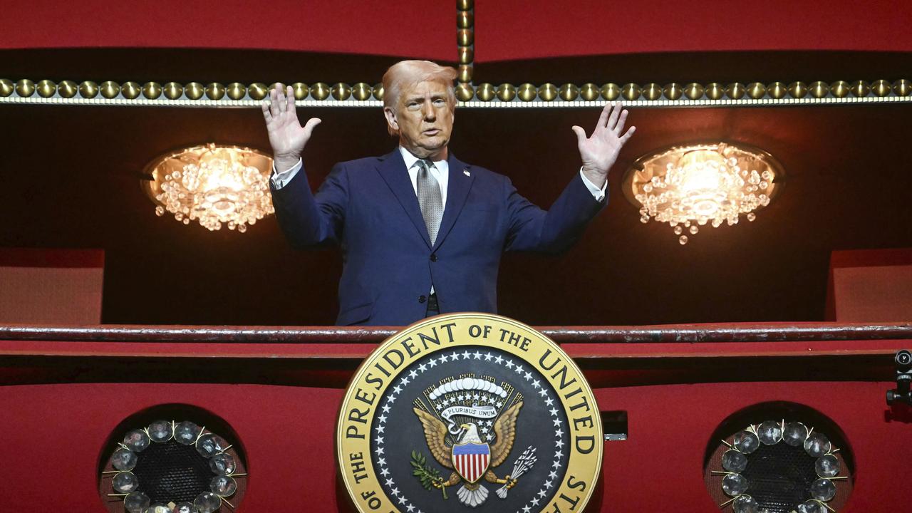 President Donald Trump stands in the presidential box as he tours the John F. Kennedy Center. Picture: AP