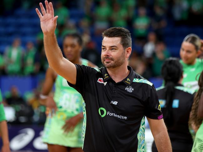 Fever coach Dan Ryan waves to the crowd after round six win. Picture: James Worsfold/Getty Images